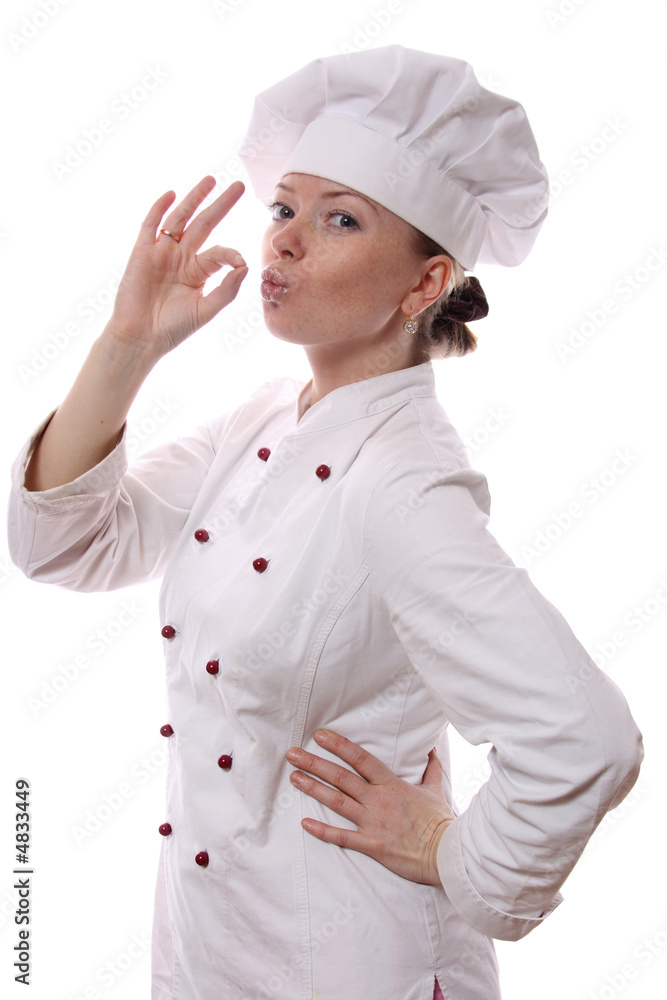 Happy attractive cook woman becoming lean the fingers a over whi