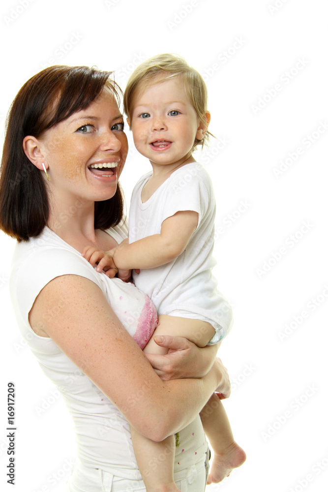 幸福的母亲带着白色婴儿的照片