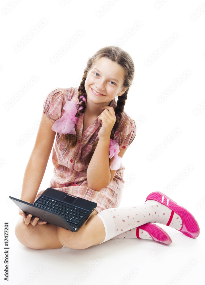 Teenager girl sit holding small laptop