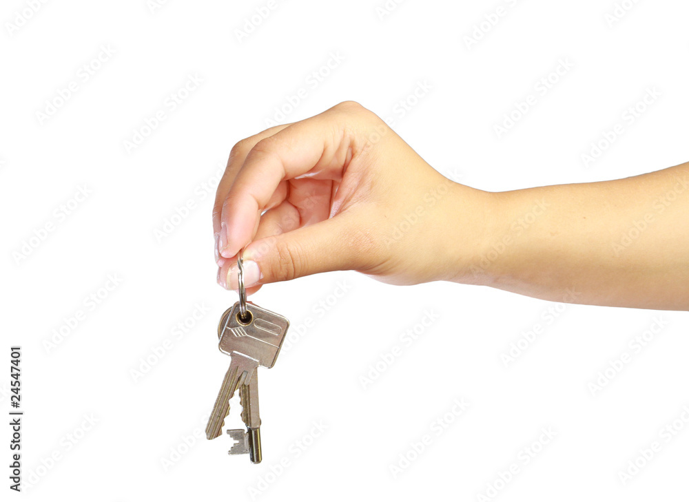 Woman hand with keys to new house