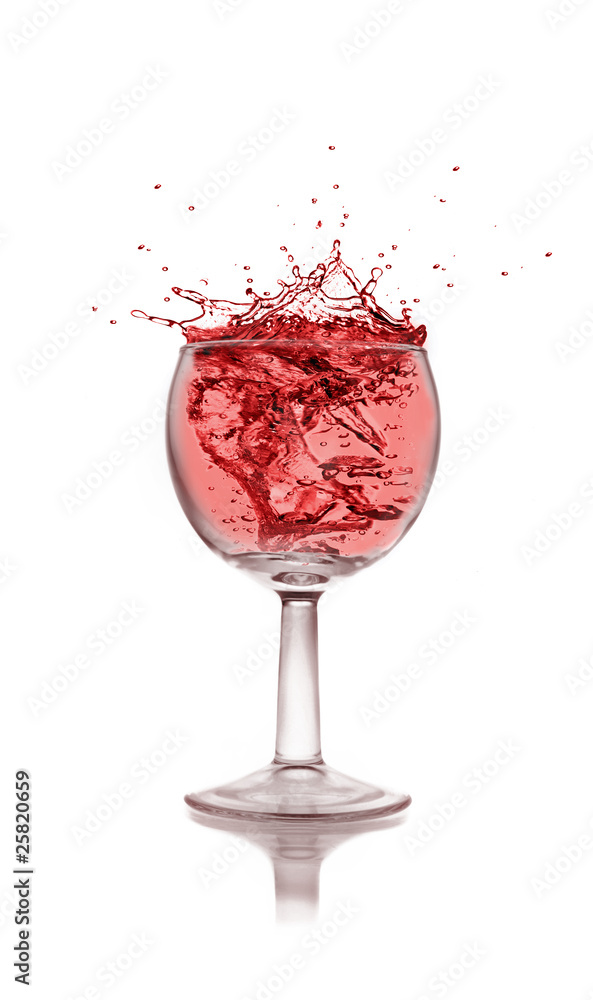 Glass with red wine splash