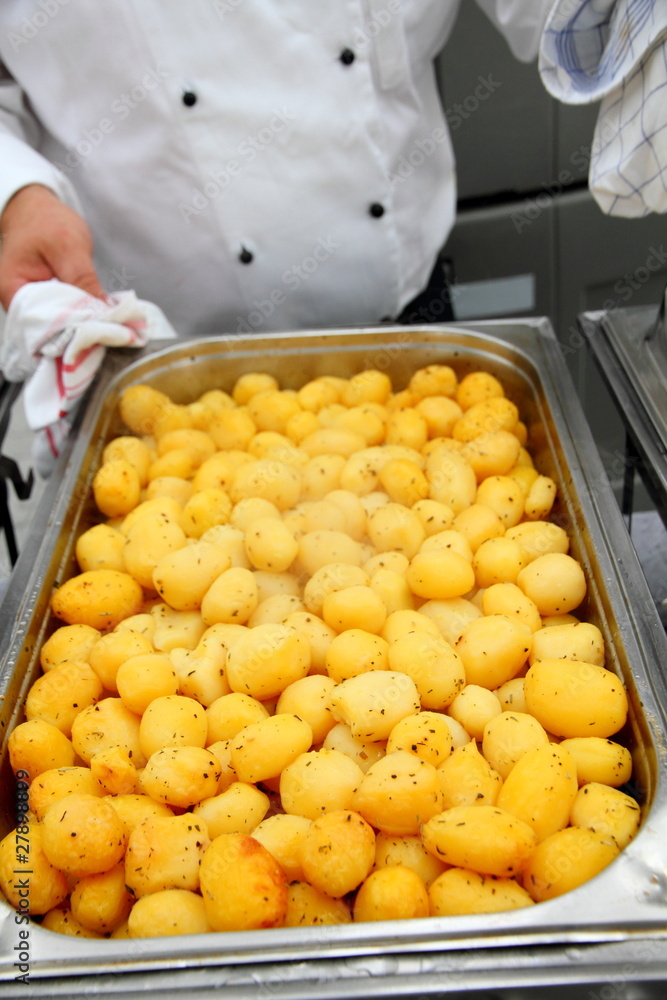 steaming freshly cooked potatoes in restaurant