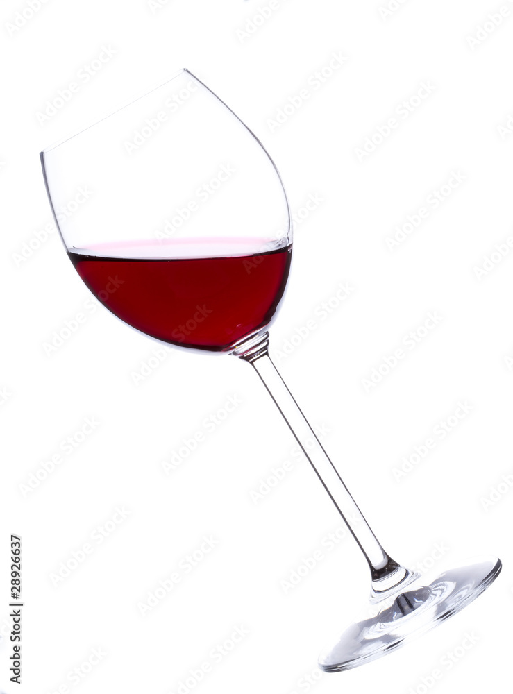 Glass of red wine over white background