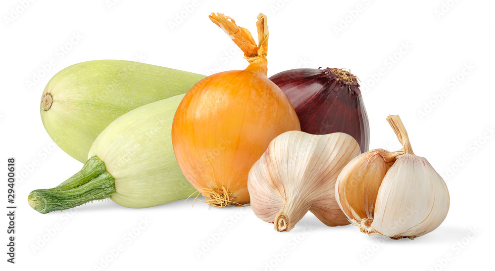 Isolated vegetables. Zucchini, onion and garlic isolated on white background