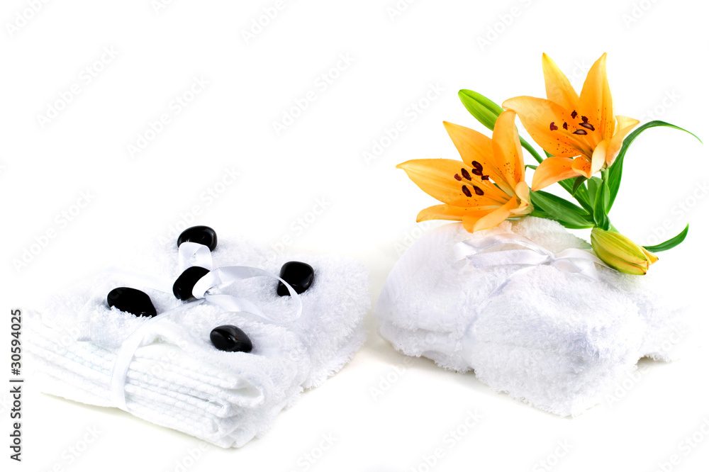 Lily flowers on white towels