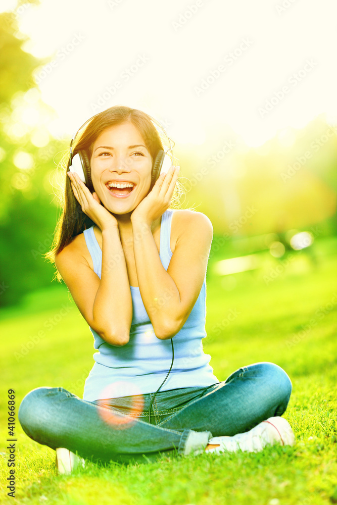 Music headphones woman in park