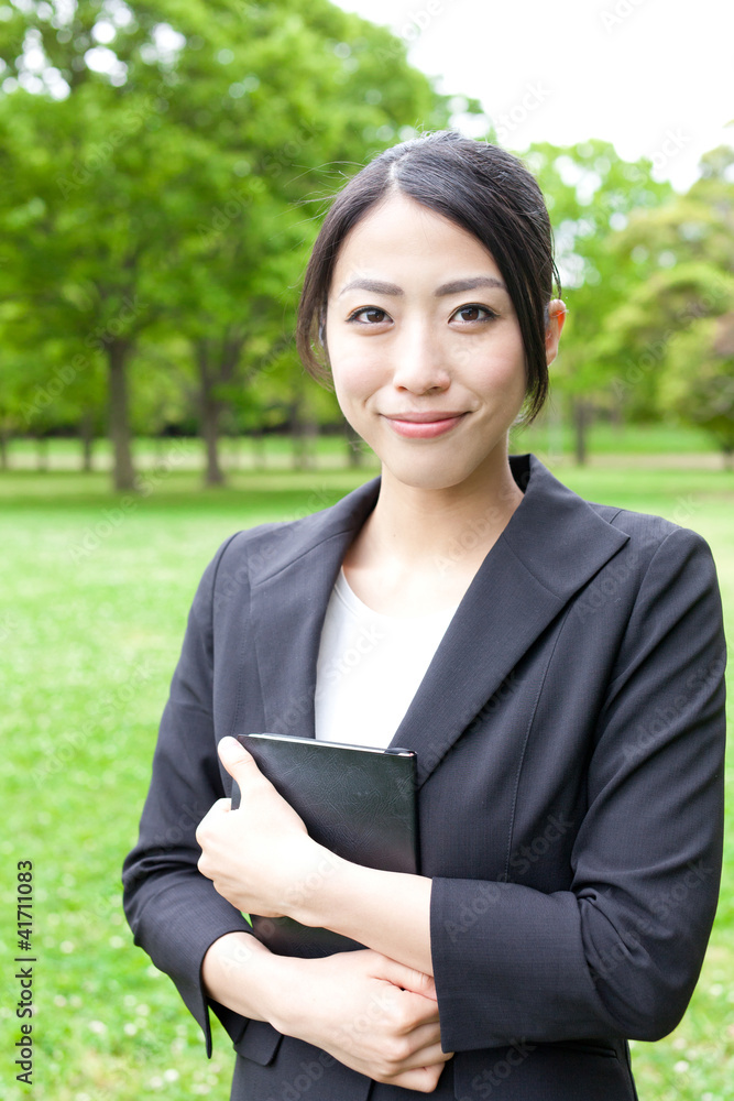 asian businesswoman in the park
