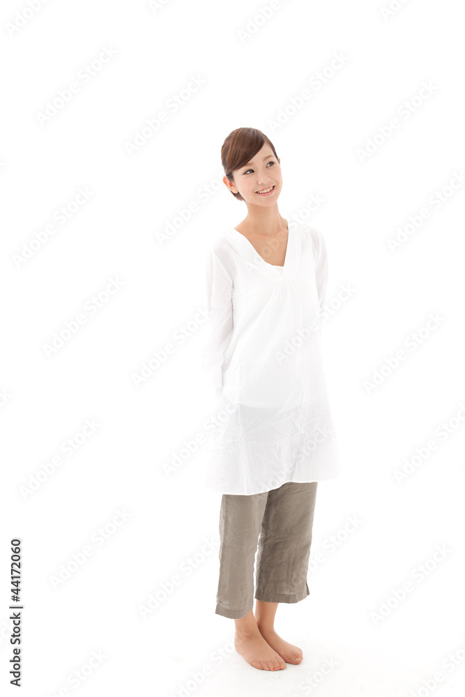 attractive asian woman relaxing on white background