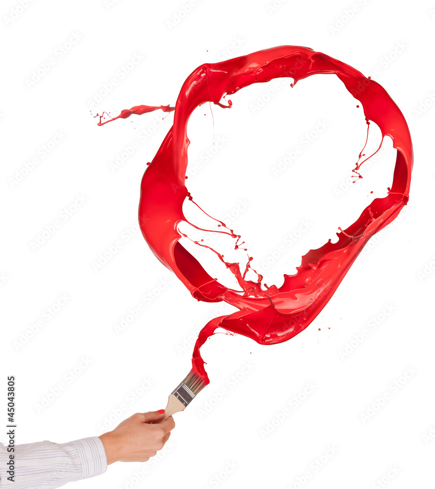 Woman hand painting red splashes circle on white background