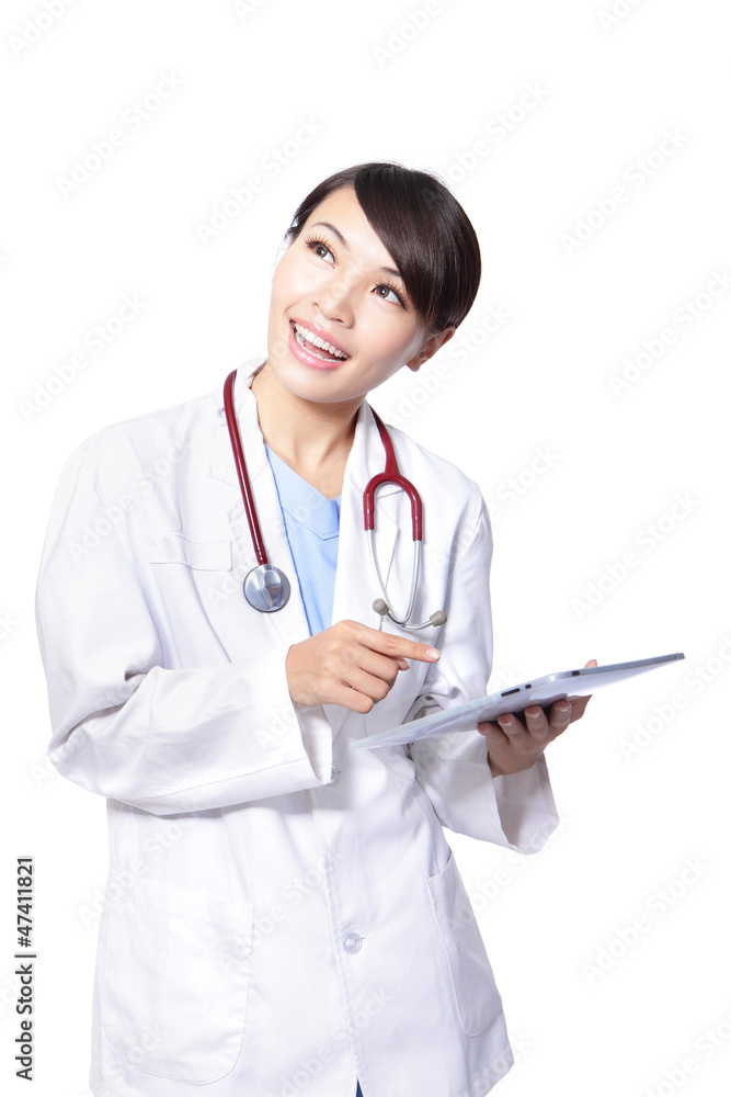 doctor woman using pc and look copy space