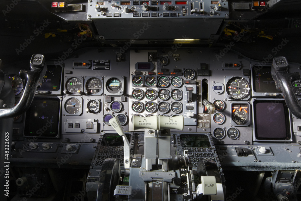 Center console and throttles in the airplane.