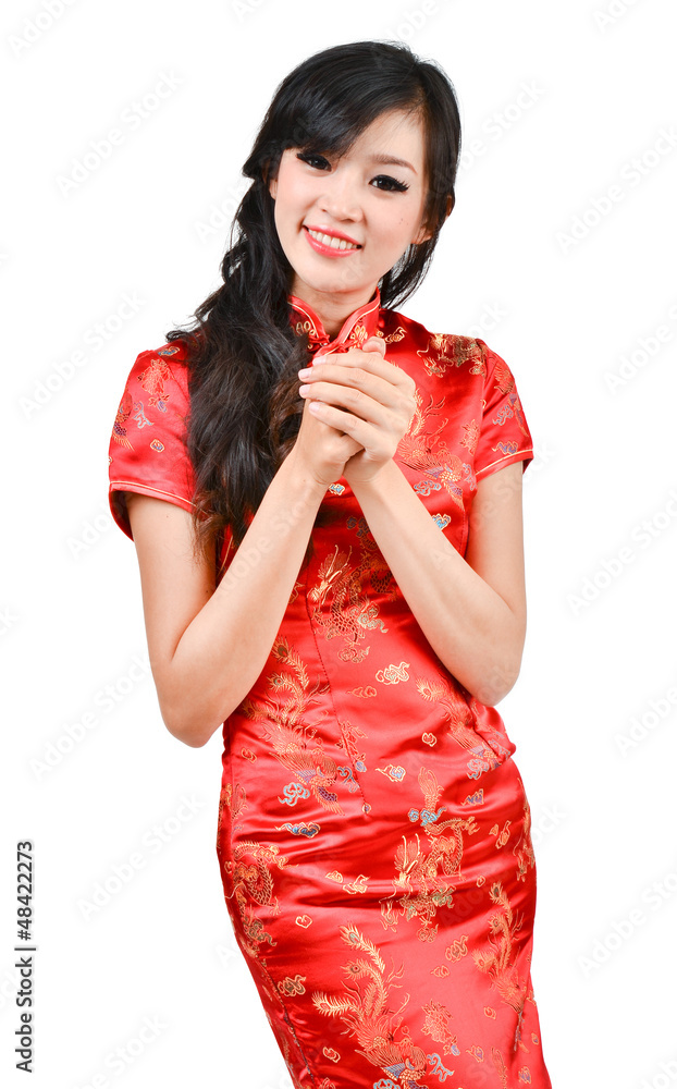 pretty girl with cheongsam wishing you a happy Chinese new year
