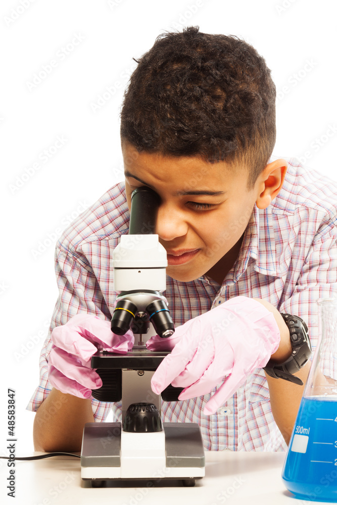 Black boy with microscope