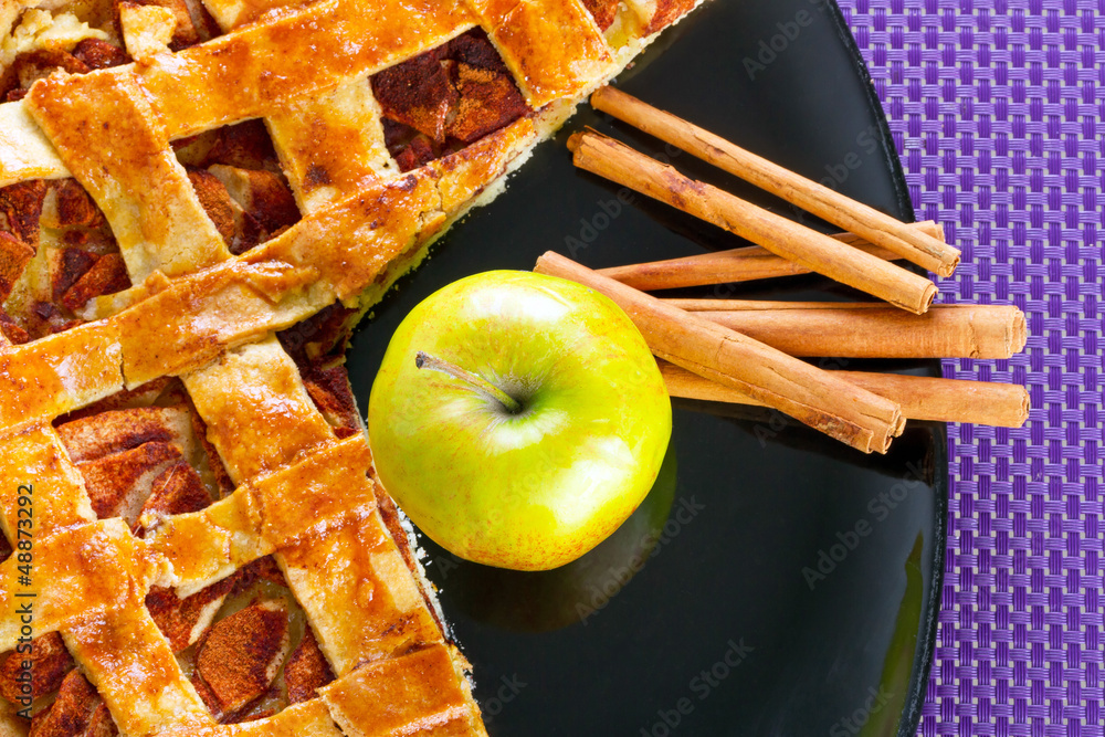Apple pie with cinnamon on the plate