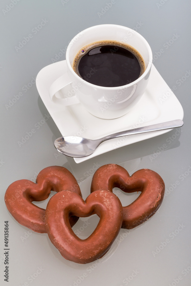 Gingerbread heart with coffee as a love symbol