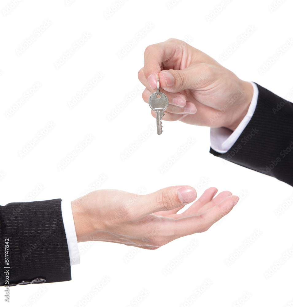 Male hand holding apartment keys
