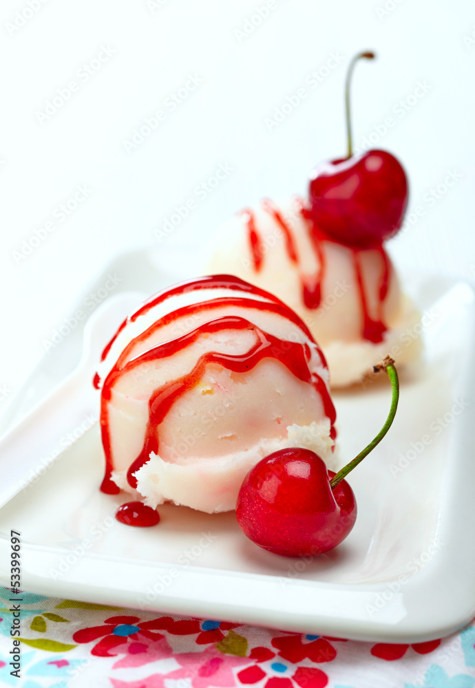 fruit sorbet decorated with fresh red cherry