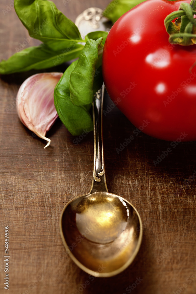 Spoon with Olive Oil and vegetables