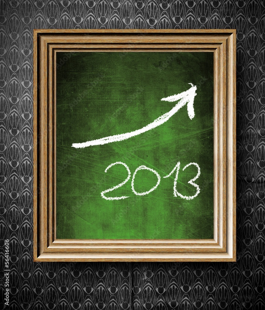 Growth trend of 2013 with copy-space chalkboard in old frame