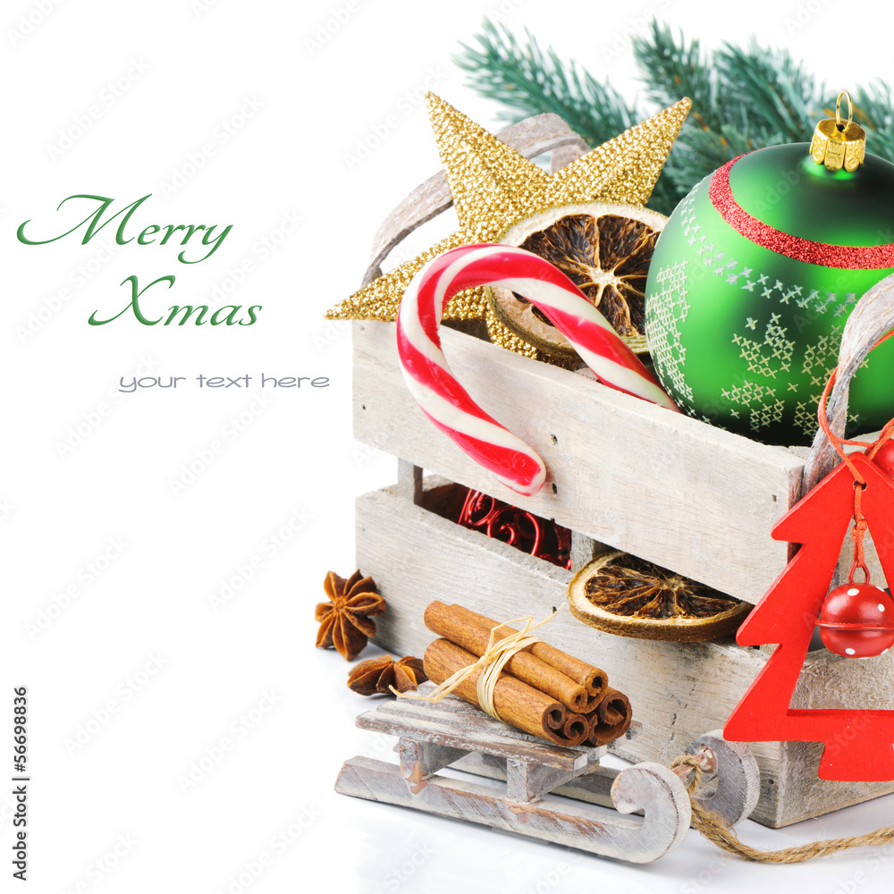Old wooden box with colorful Christmas decorations