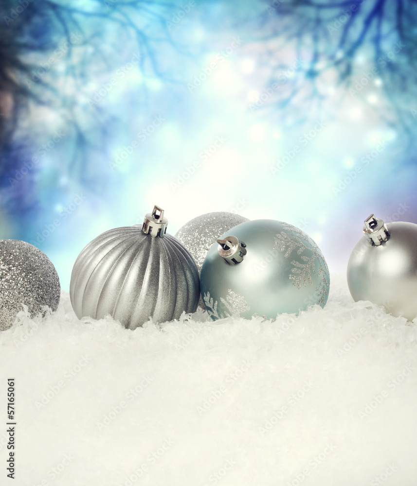 Christmas baubles on the snow
