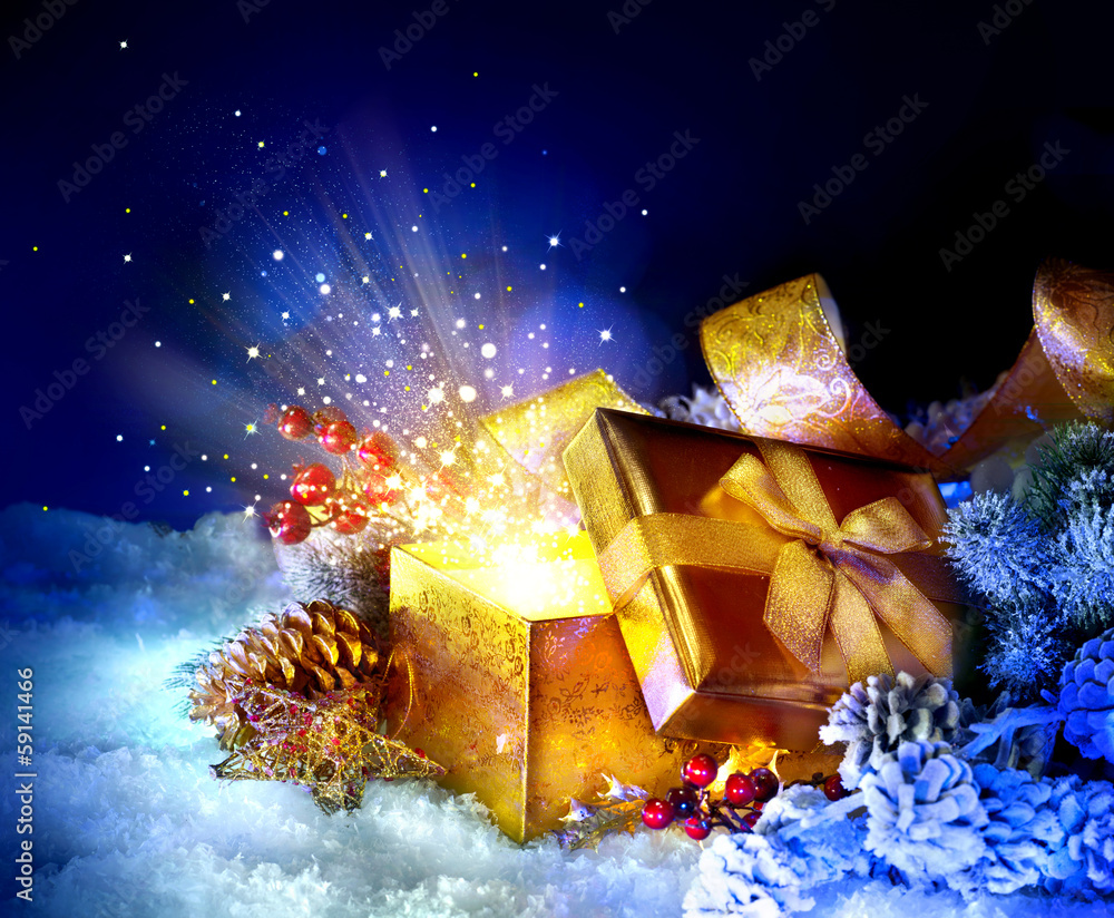 带奇迹的圣诞礼盒。神奇的星星和光