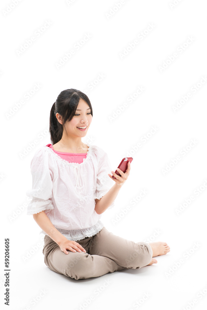 young asian woman using smart phone on white background
