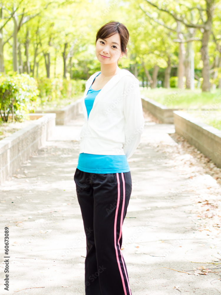 young asian sporty woman in the park