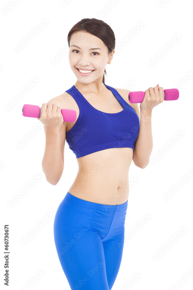 Young attractive sporty woman with dumbbells