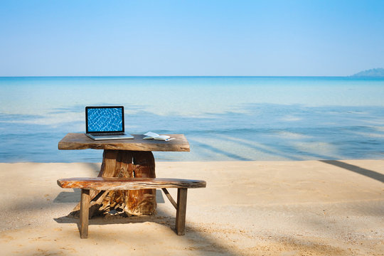 office on the beach, computer and table