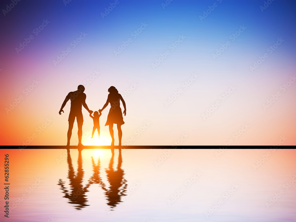 Happy family together, parents and their child at sunset,