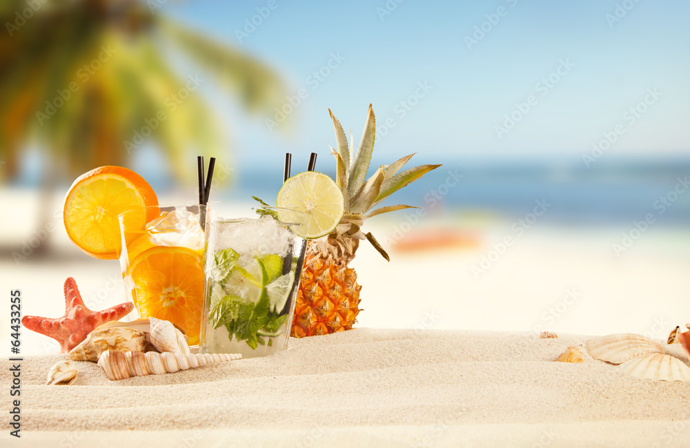 Summer beach with drinks and accessories