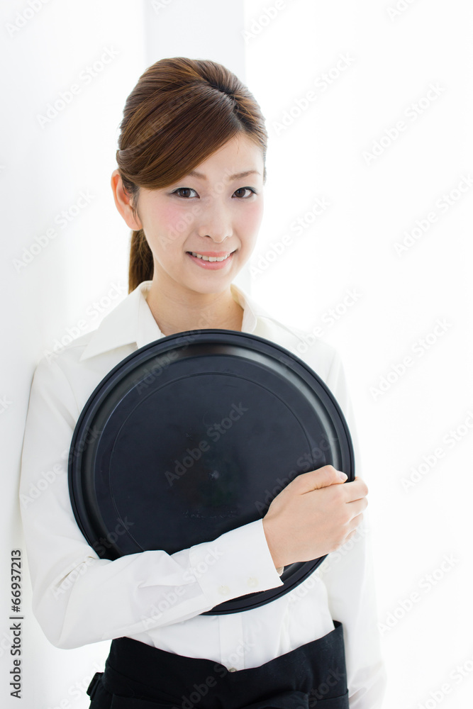 young asian waitress in white room