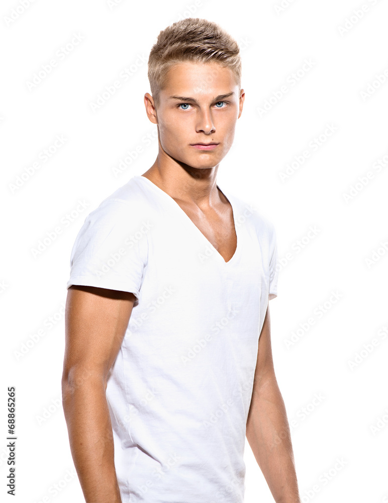 Handsome young man in white t-shirt isolated on a white