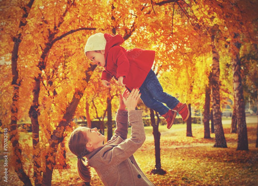 нарру family. Mom and baby daughter for walk in autumn