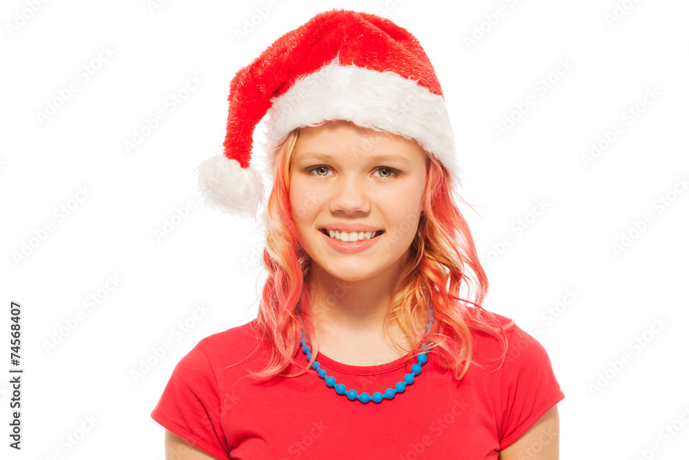 戴着圣诞老人圣诞帽微笑的金发女孩快乐