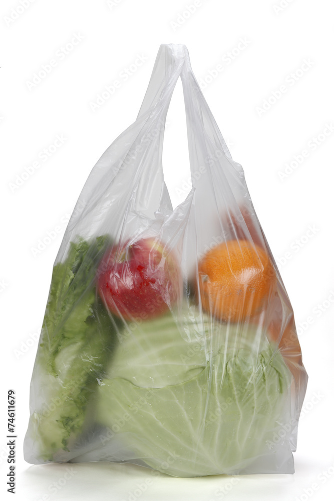 Clear plastic grocery bag isolated on white