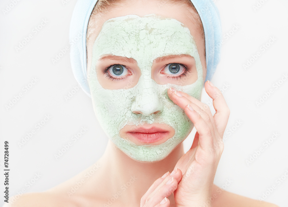 beautiful girl in  bathroom and mask for facial skin care