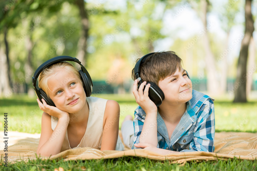 Kids wearing headphones