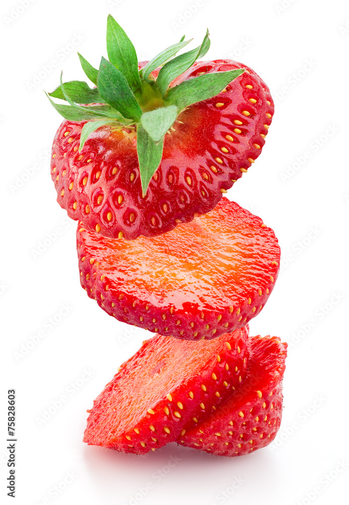 Strawberry slices are falling. Isolated on white