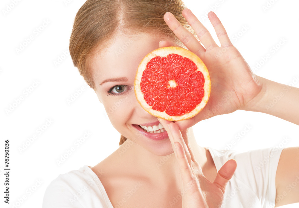 快乐的年轻葡萄柚女士。健康饮食