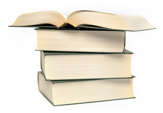 Stack of four books on a white background