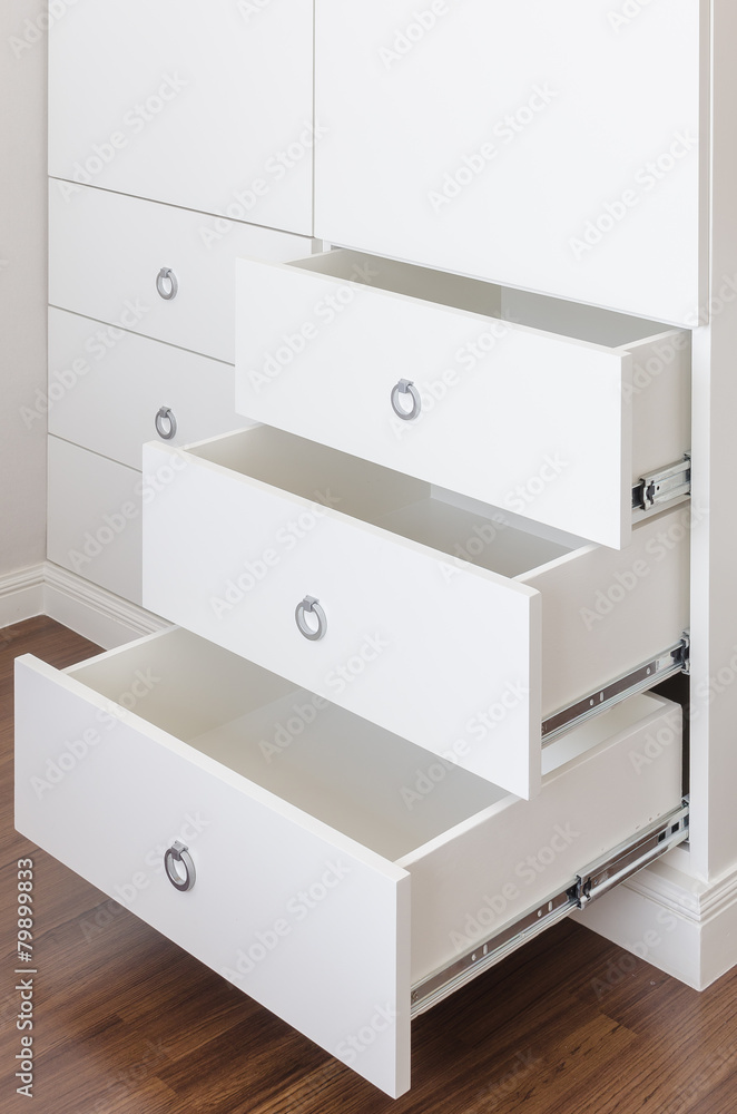 white empty drawer with round stainless handle