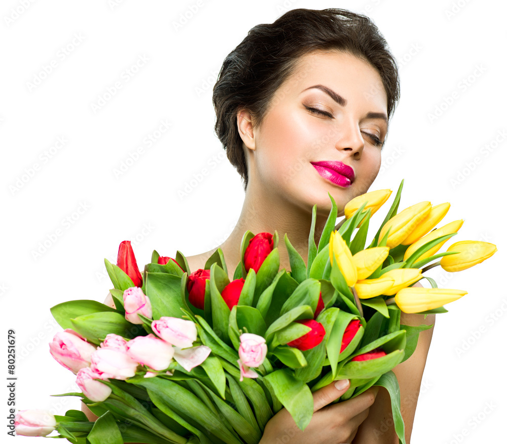 Beauty model woman with spring tulip flowers bouquet