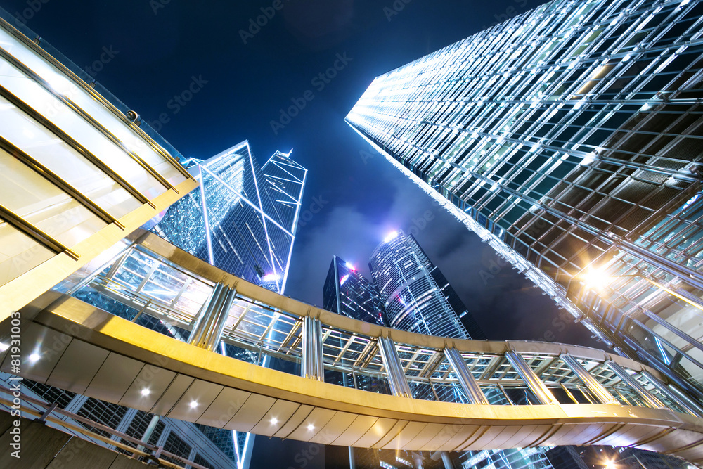low angle view of illuminated buildings at modern city
