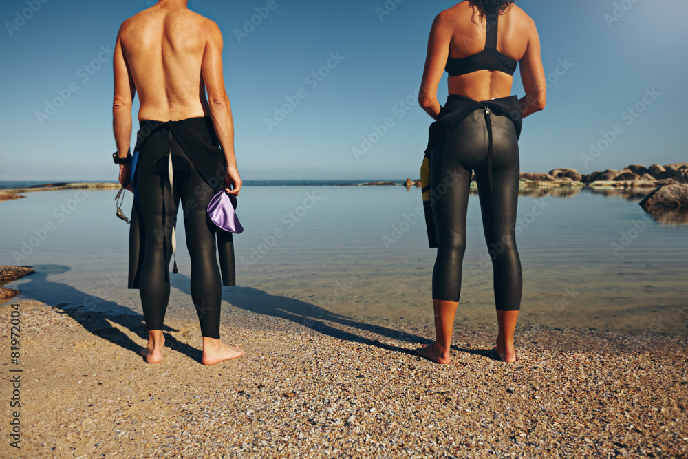 Man and woman preparing for triathlon