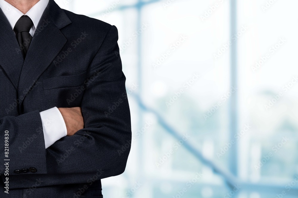 Security Guard. Businessman with Arms Crossed On White