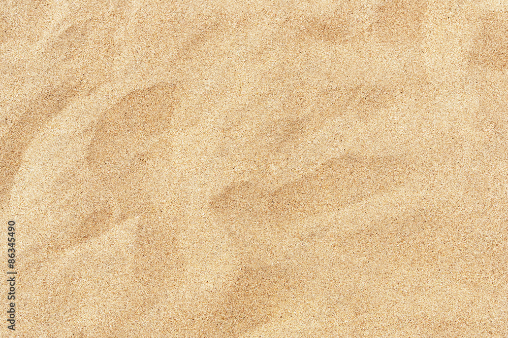 夏日阳光下的沙滩细沙