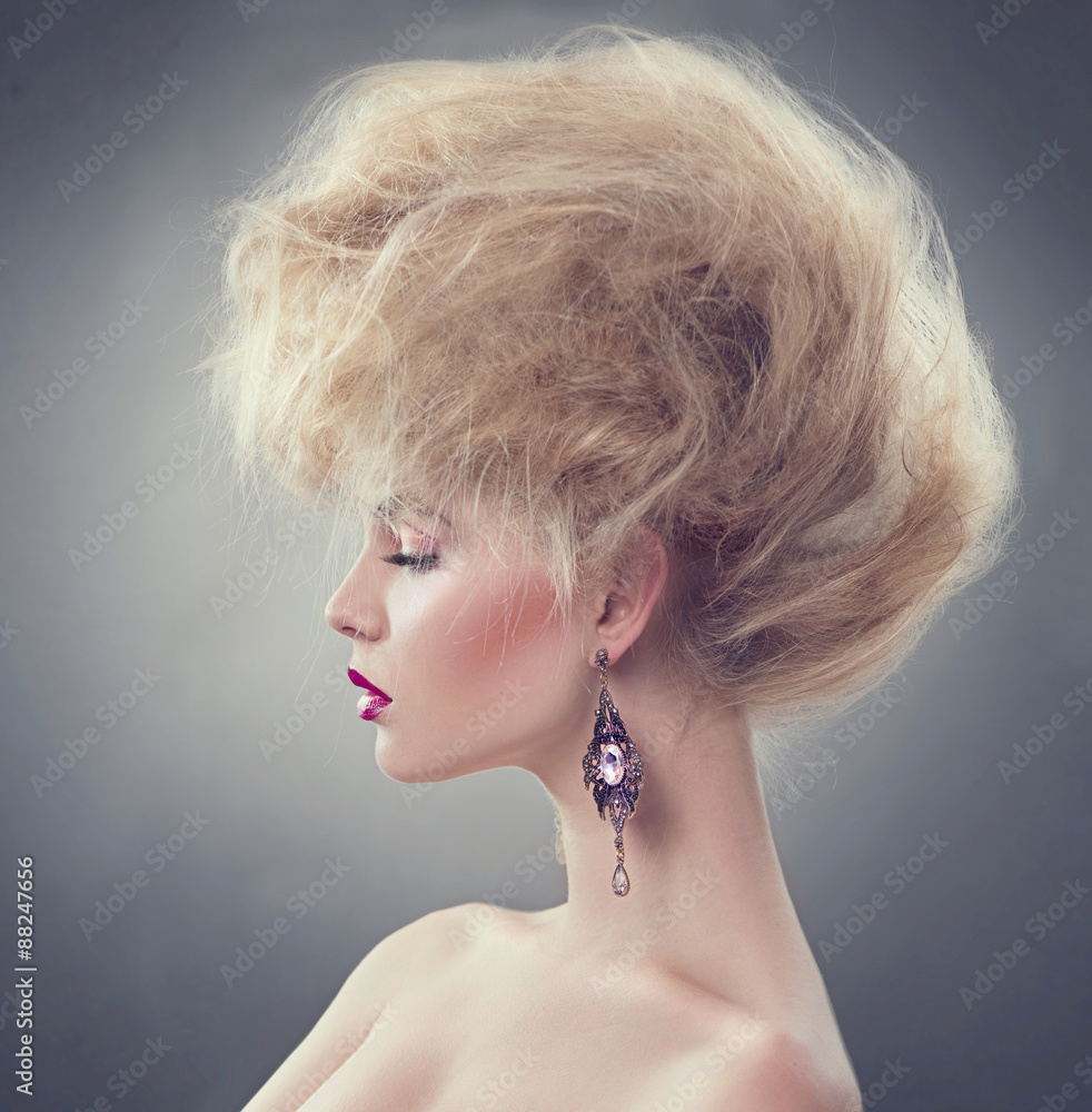 High fashion model girl with updo hairstyle