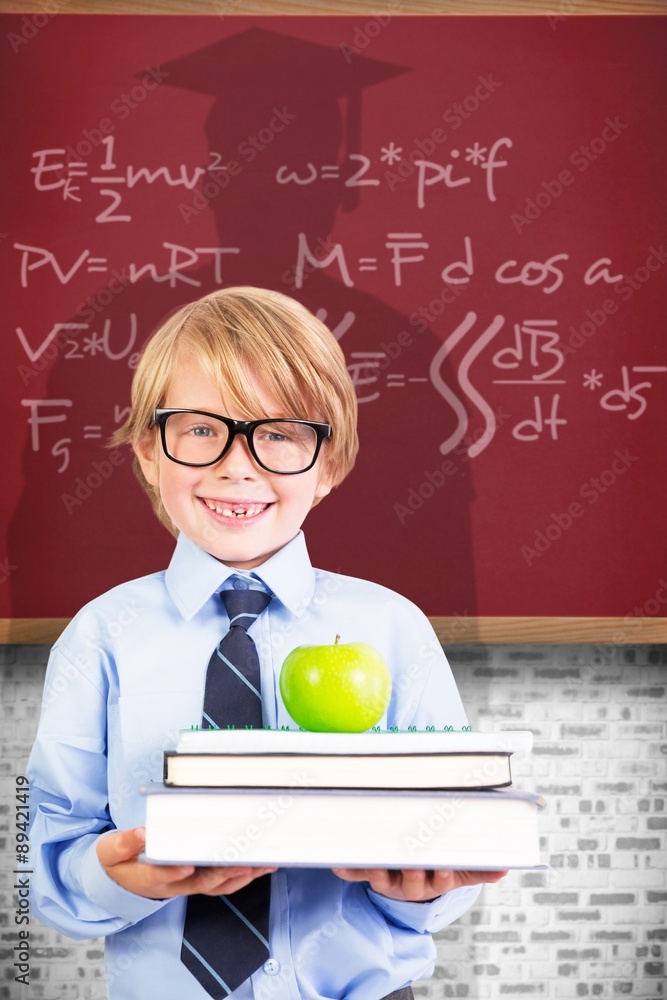 可爱的小学生拿着书和苹果的合成图